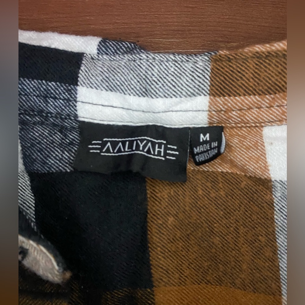A vintage Aaliyah flannel button up